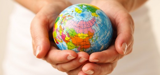 Woman holding globe